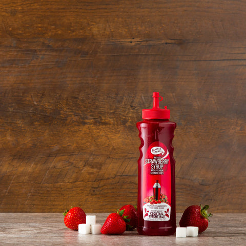 Master of mixes cocktail essentials strawberry syrup, perfect for making cocktails and mocktails. 