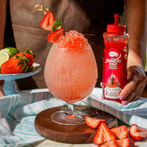 A slush cocktail made using Master of mixes cocktail essentials strawberry syrup, perfect for making cocktails and mocktails. 