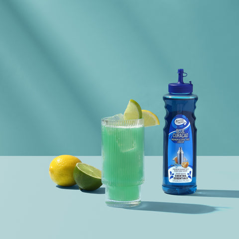 A cocktail made with Master of mixes cocktail essentials blue curacao, perfect for making cocktails and mocktails. 