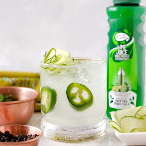 A cocktail made with Master of mixes cocktail essentials lime juice, perfect for making cocktails and mocktails or cooking and baking. 