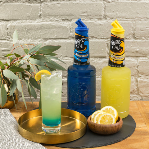 A cocktail that's been made with both premium Finest Call blue curacao & sweet & sour. 