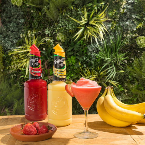 A sluch cocktail that's been made using Finest call banana and strawberry syrup.