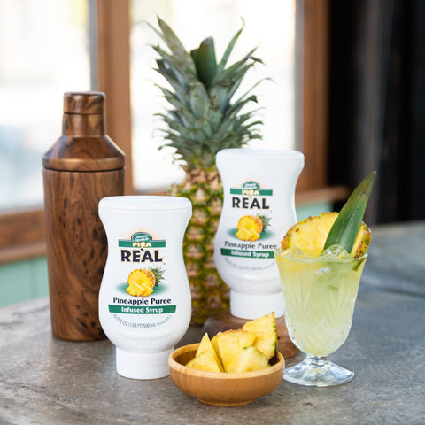 Real pineapple puree syrup, a vegan and gluten-free syrup that's the perfect for making cocktails or mocktails, cooking or baking and making drinks such as dirty sodas.