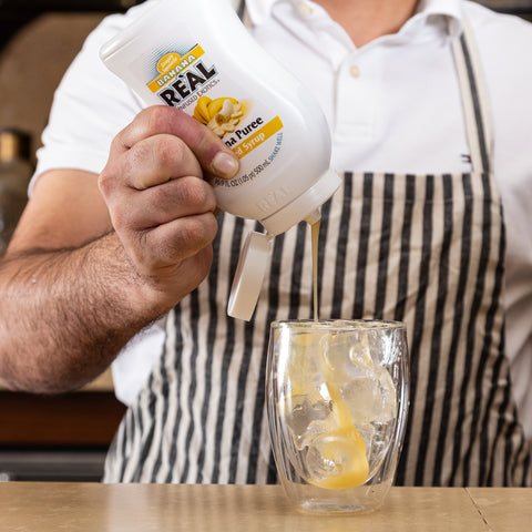 Banana Reàl Squeeze into glass of ice