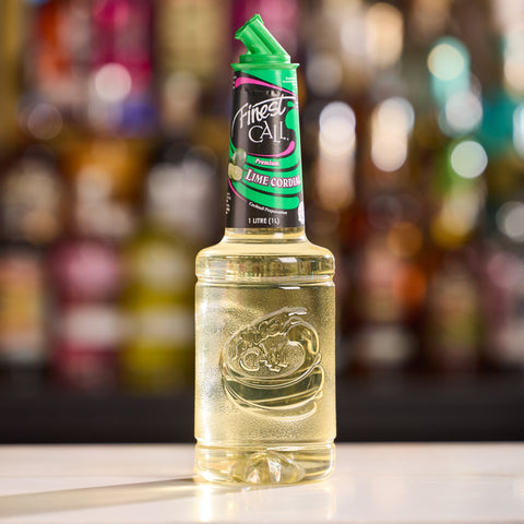 A bottle of Finest Call premium lime cordial, a perfect cocktail or mocktail ingredient. 