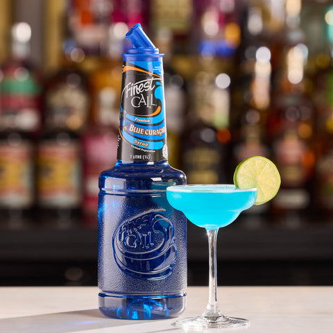 A cocktail that's been made using Finest Call's premium blue curaçao syrup. 