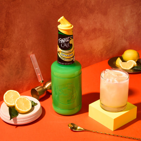 Finest Call Single Pressed Lemon Juice with serve and fresh lemons