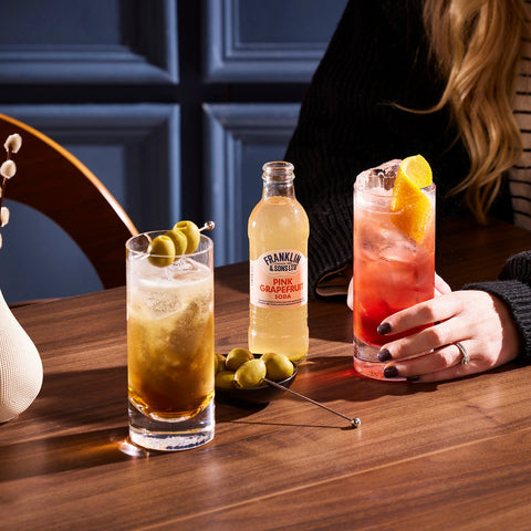 Two cocktails made with Franklin & Sons pink grapefruit soda, a premium soft drink & mixer. 