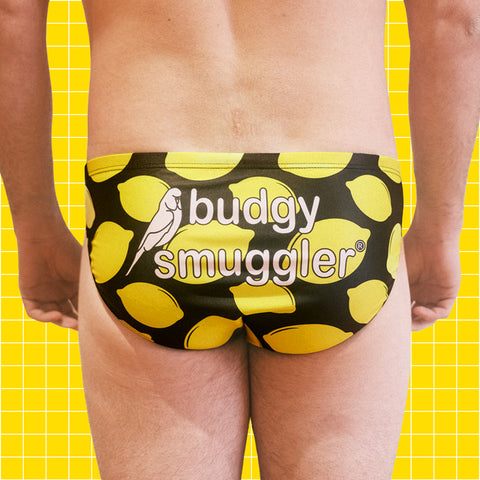 The back of the Hooch Budgy Smuggler's. Vibrant lemon print with budgy smuggler text in the middle.