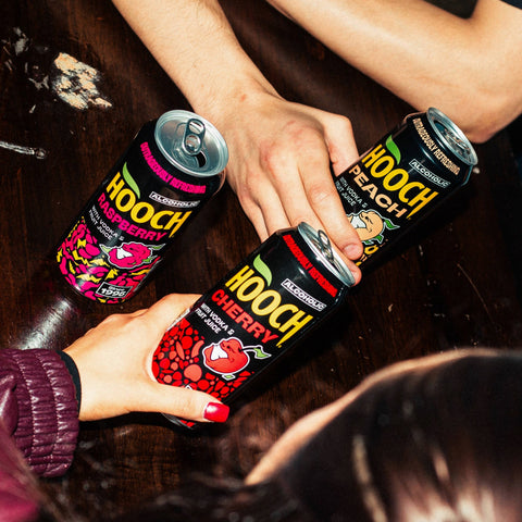 Three cans of Hooch premixed and ready to drink alcopops. 