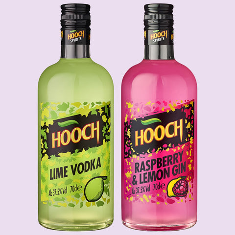 Two bottles of Hooch Vodka and Gin on a light purple background