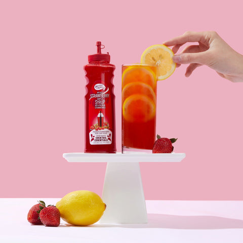 A strawberry lemonade made with Master of Mixes Cocktail Essential Strawberry Syrup. A non-alcoholic syrup for mocktails, cocktails and sodas. 