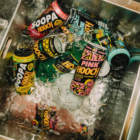 Hooch drink in a sink full of ice, 90s retro alcopops house party