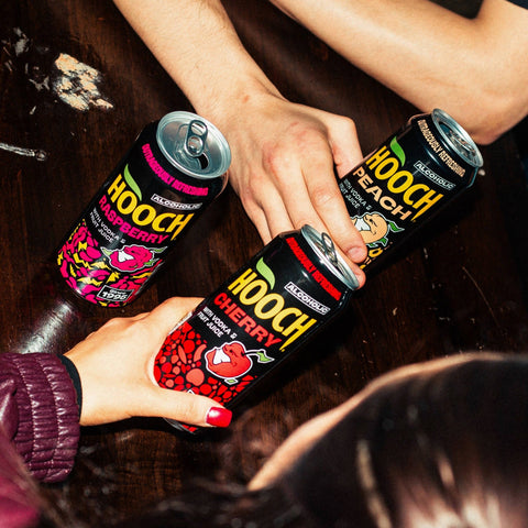 Three cans of Hooch premixed and ready to drink alcopops. 