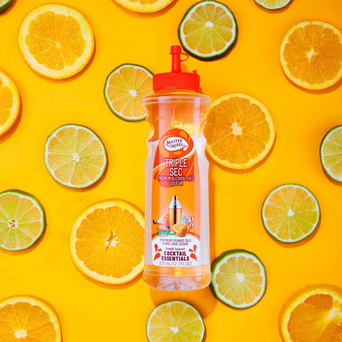 Master of Mixes Cocktail Essentials Triple Sec Syrup, a non-alcoholic syrup made for mixing cocktails, mocktails, sodas and slushes. 