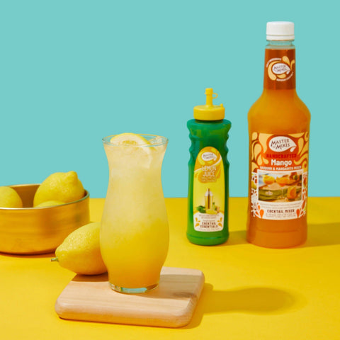 A mango cocktail made with Master of Mixes Cocktail Essentials Single Pressed Lemon Juice and Master of Mixes Mango Daiquiri and Margarita Miz, with the Master of Mixes bottles placed behind the cocktail. 