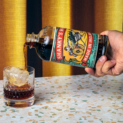 Shany's Whip Black Irish Liqueur poured on the rocks