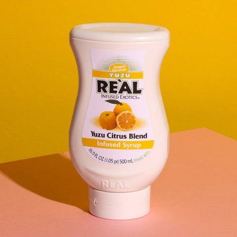 A bottle of Reál Yuzu Citrus Blend Infused Syrup. 