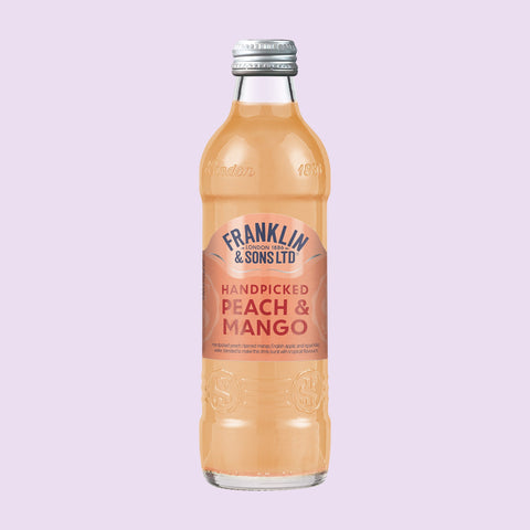 A bottle of Franklin & Sons peach & mango premium soft drink. 