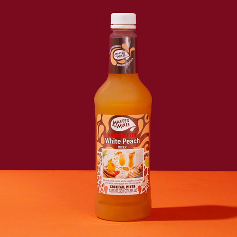 A bottle of Master of Mixes White Peach cocktail mixer, a non-alcoholic cocktail and mocktail mixer. 