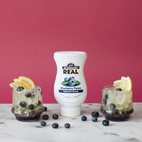 Two drinks made with blueberry Real syrup. 