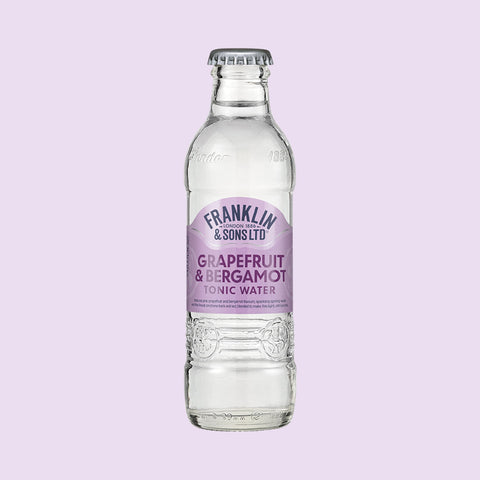 A glass bottle of Franklin & Sons Grapefruit & Bergamot Tonic Water, a premium tonic water. 