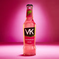 A bottle of VK Watermelon, a ready-to-drink alcoholic beverage with a pink label and watermelon design, against a pink background.