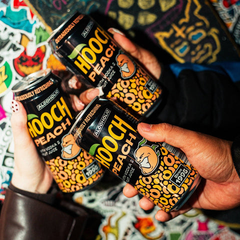 People holding and drinking Hooch Peach cans, premixed and ready to drink alcopops. 