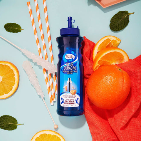Master of mixes cocktail essentials blue curacao, perfect for making cocktails and mocktails. 