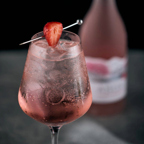 A cherry blossom spritz cocktail made with Asuki Cherry Blossom Liqueur. 