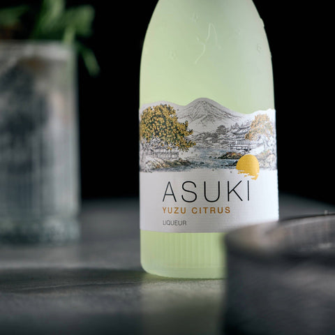A bottle of Asuki Yuzu Citrus Liqueur, an Asian inspired liqueur. 