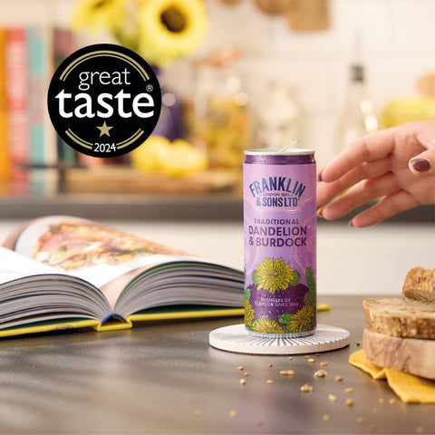 A can of Franklin & Sons Traditional Dandelion & Burdock Premium soft drink, with a great taste 2024 badge. 