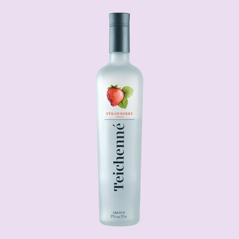 A bottle of Teichenne strawberry liqueur on a light purple background. 