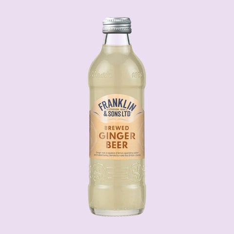 A bottle of Franklin & Sons brewed ginger beer, which is a premium soft drink. 