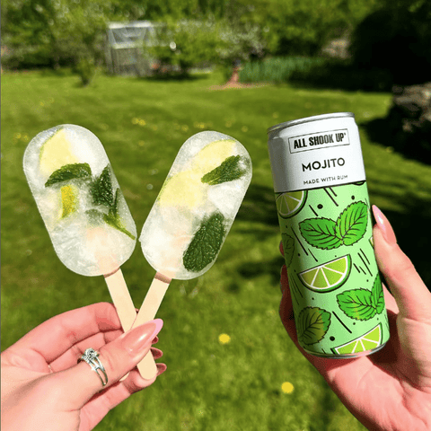 All Shook Up Mojito premixed, ready to drink canned cocktail, made into two ice lollies. 