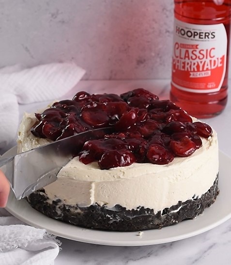 Good Time In | A cherry cheesecake with Hooper's Classic Cherryade in the background